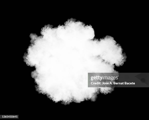 explosion with a cloud of white smoke on a black background - creative destruction stock pictures, royalty-free photos & images