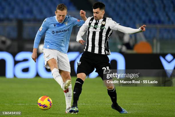 Lucas Leiva of SS Lazio compete for the ball with Ignacio Pussetto of Udinese Calcio during the Coppa Italia match between SS Lazio v Udinese Calcio...