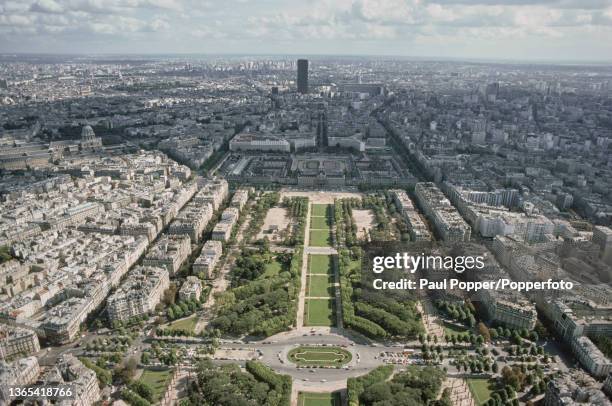 Panoramic view from the top of the Eiffel Tower of the City of Paris with the Champ de Mars in centre and buildings of the 14th and 15th...