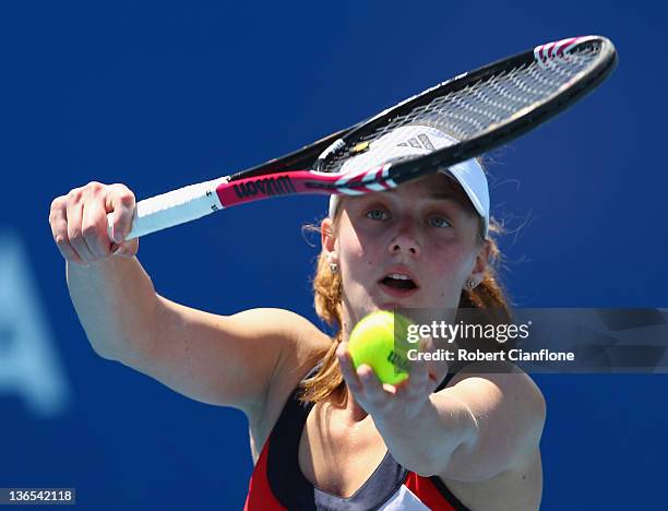 Anna Chakvetadze of Russia prepares to serve in her singles match against Monica Niculescu of Romania during day one of the 2012 Hobart International...