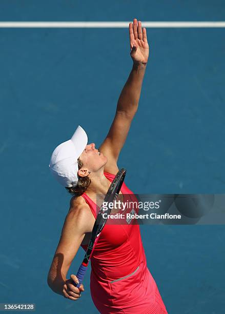 Greta Arn of Hungary serves in her singles match against Anastasia Rodionova of Australia during day one of the 2012 Hobart International at Domain...