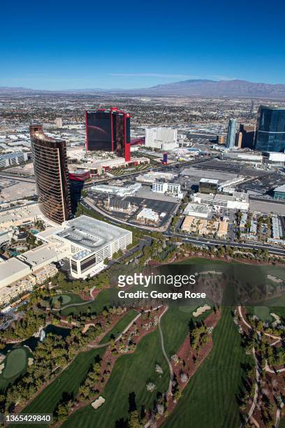 The recently completed Resorts World complex of shopping malls and a casino, along with the Encore/Wynn Hotel and golf course, is viewed along the...