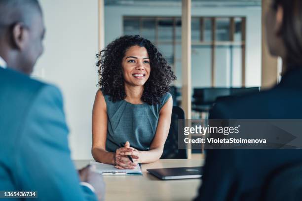 group of business persons talking in the office. - interview event stock pictures, royalty-free photos & images