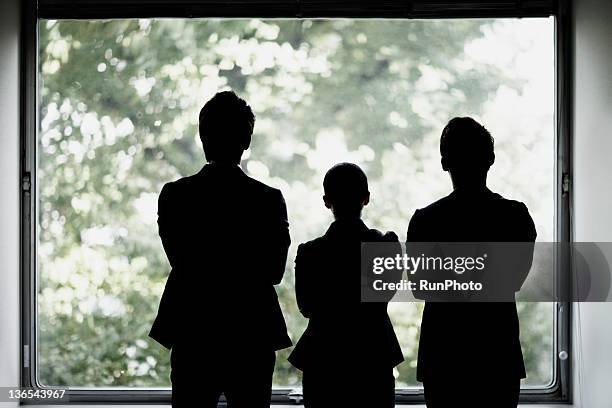 businessmen in the office - three people silhouette stock pictures, royalty-free photos & images