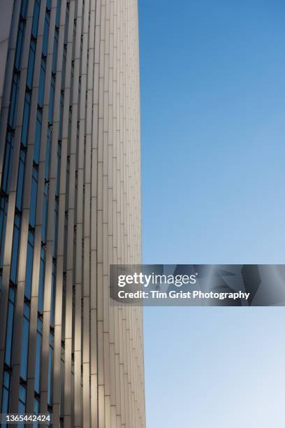 exterior office building detail and sky - commercial real estate as investment increases stock pictures, royalty-free photos & images