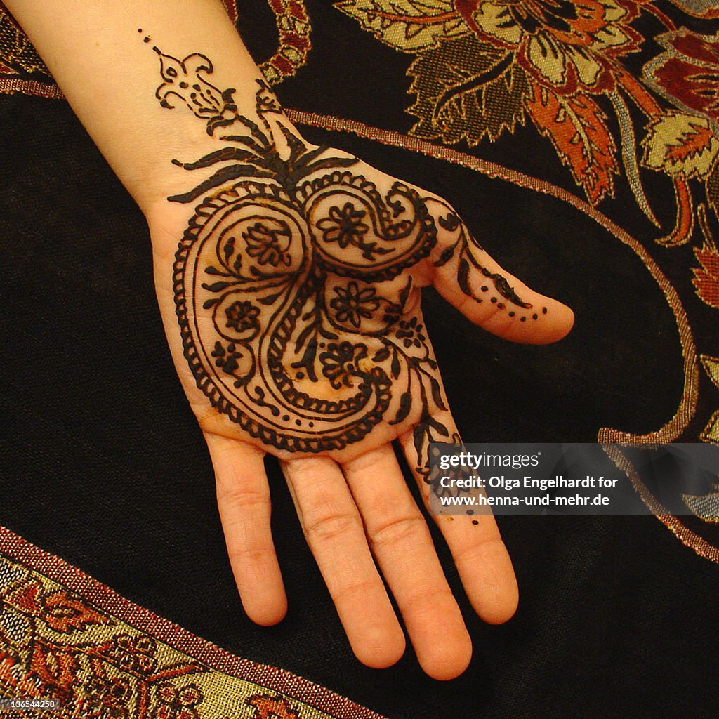 Henna on woman hand