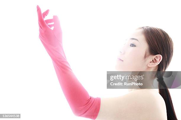 young woman with red glove - formal glove stock pictures, royalty-free photos & images