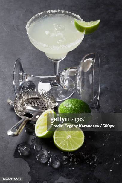 margarita cocktail,high angle view of drink on table - tequila tasting stock pictures, royalty-free photos & images