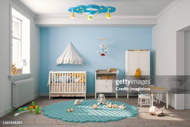 baby's bedroom in light blue colors - baby crib stock pictures, royalty-free photos & images