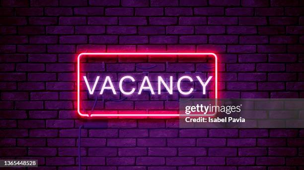 vacancy in neon lights - vacancy stock pictures, royalty-free photos & images