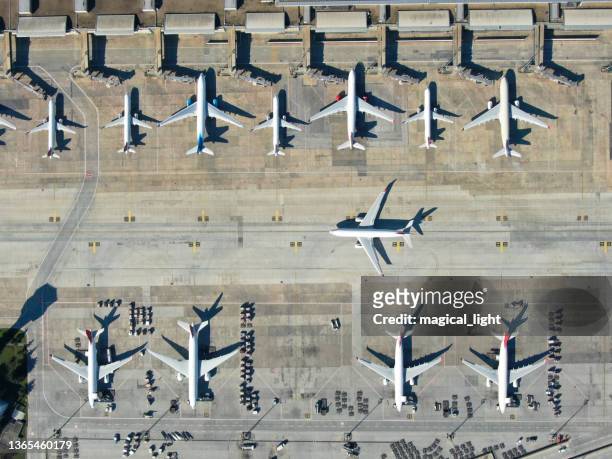 aerial view of an airport. aerial view of an airport. airport on a snowy day - airport cargo stock pictures, royalty-free photos & images