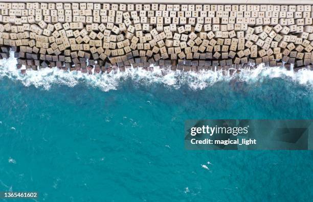 aerial view of breakwater - groyne stock pictures, royalty-free photos & images