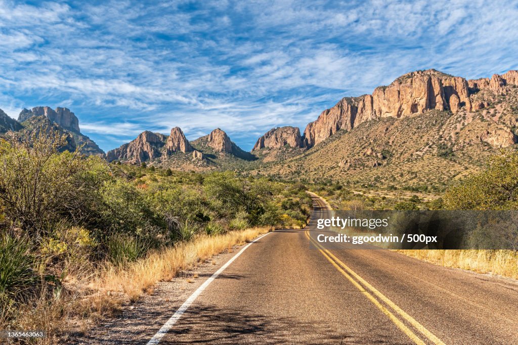 Empty road leading towards mountains against sky,Big Bend National Park,Texas,United States,USA