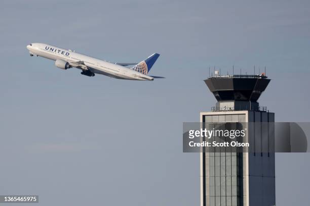 An aircraft takes off from O'Hare International Airport on January 18, 2022 in Chicago, Illinois. Major airlines have expressed concern that 5G...
