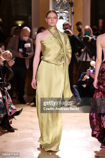 Model walks the runway at the Dawid Tomaszewski show during the Frankfurt Fashion Week January 2022 at Sofitel Frankfurt Opera on January 18, 2022 in...