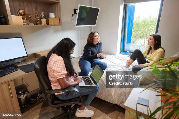 students socialising at home - college dorm stock pictures, royalty-free photos & images