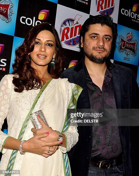 Indian Bollywood actress Sonali Bendre and husband, filmmaker Goldie Behl arrive to support Mumbai Police at their annual entertainment “Police show...