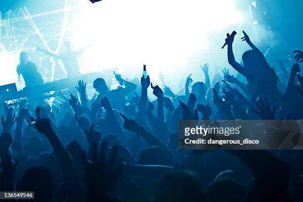 nightclub crowd - dj stock pictures, royalty-free photos & images