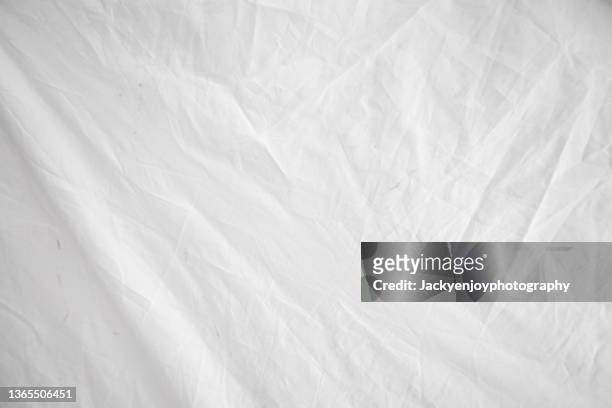 white textile fabric abstract textured background - draped sheet stock pictures, royalty-free photos & images