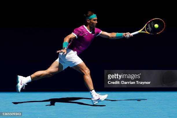 Rafael Nadal of Spain plays a forehand in his second round singles match against Yannick Hanfmann of Germany during day three of the 2022 Australian...