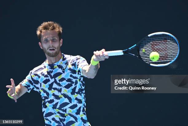 Corentin Moutet of France plays a forehand in his second round singles match against Sebastian Korda of United States during day three of the 2022...