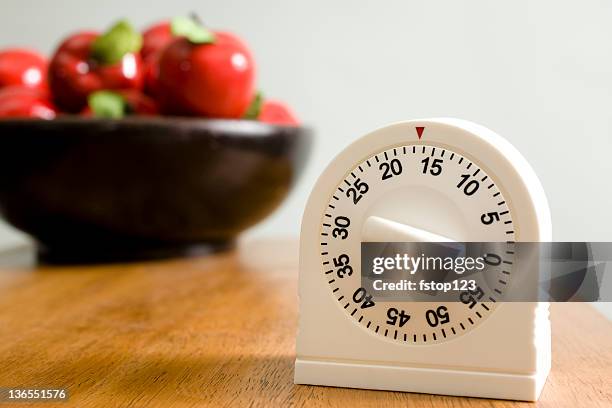 time.  kitchen timer on counter - minute timer stock pictures, royalty-free photos & images