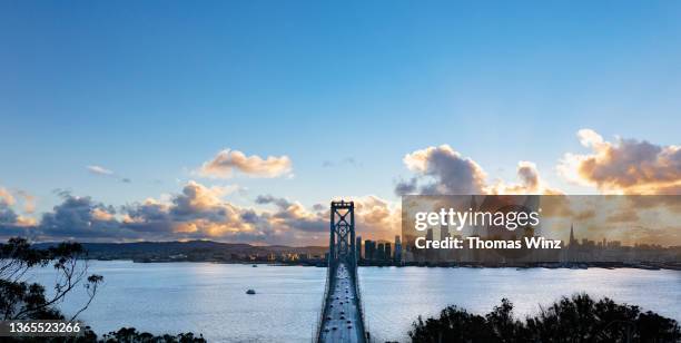 san francisco skyline with bay bridge from above - transamerica pyramid stock pictures, royalty-free photos & images