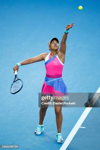 Naomi Osaka of Japan serves in her second round singles match against Madison Brengle of United States during day three of the 2022 Australian Open...