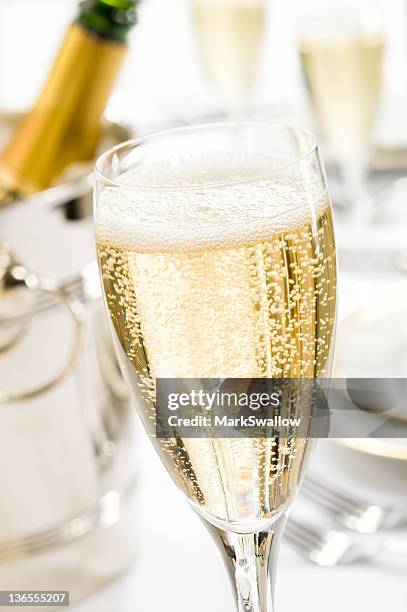 glass of champagne - champagne glass stockfoto's en -beelden