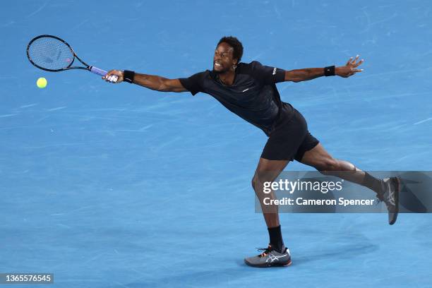 Gael Monfils of France plays a forehand in his second round singles match against Alexander Bublik of Kazakstan during day three of the 2022...