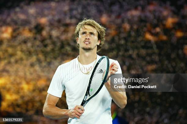 Alexander Zverev of Germany celebrates after winning match point in his second round singles match against John Millman of Australia during day three...