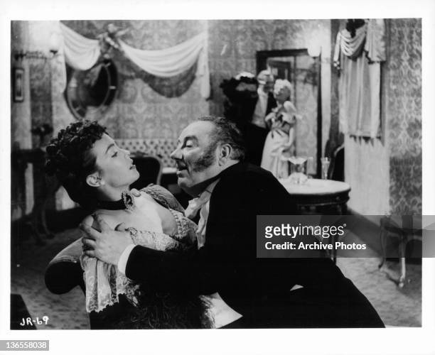 Two unknown actors in a scene from the film 'Jack The Ripper', 1959.