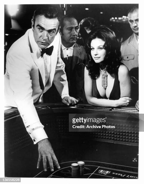 Sean Connery and Lana Wood at the gambling table in a scene from the film 'James Bond: Diamonds Are Forever', 1971.