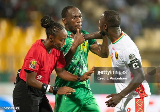 Salima Mukansanga of Rwanda in action as she becomes the first woman to referee a match at the finals of the Africa Cup of Nations as she keeps...