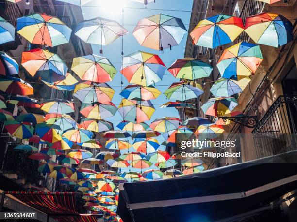 street covered with many umbrellas in catania, sicily - installation art stock pictures, royalty-free photos & images