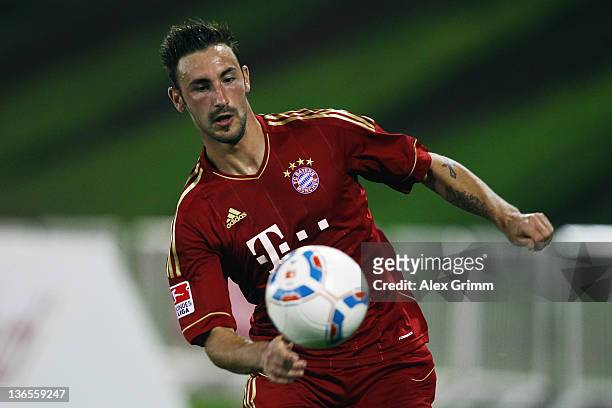 Diego Contento of Muenchen controles the ball during a training match between Bayern Muenchen and a Under-19 team of Aspire at ASPIRE Academy for...
