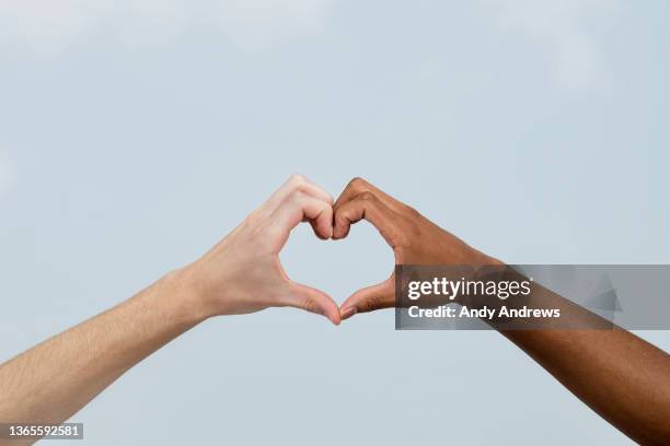 hands making a heart shape - hand sign stock pictures, royalty-free photos & images