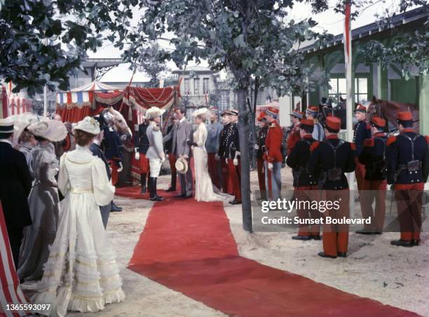 Jean Marais, Mel Ferrer and Ingrid Bergman on the set of the film 'Elena et les hommes' by Jean Renoir.