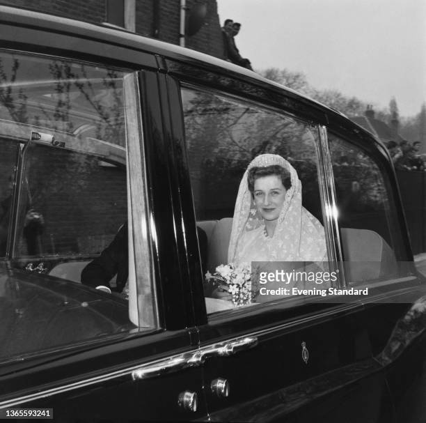 Princess Alexandra of Kent drives to Westminster Abbey in London by car for her wedding to Angus Ogilvy, 24th April 1963.