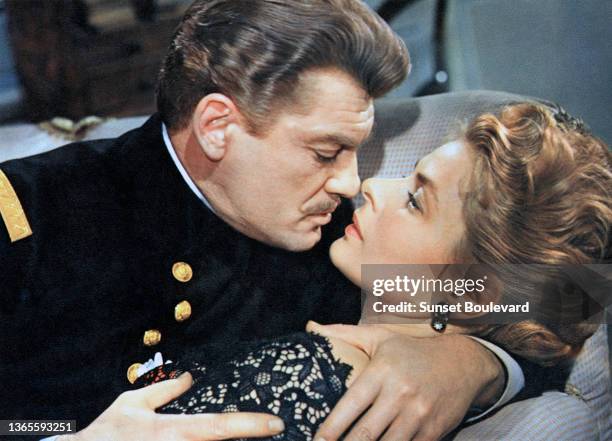 Jean Marais and Ingrid Bergman on the set of the film 'Elena et les hommes' by Jean Renoir.