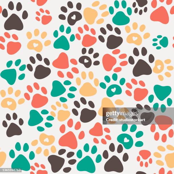 nahtlose paw print hintergrund - raubkatze stock-grafiken, -clipart, -cartoons und -symbole