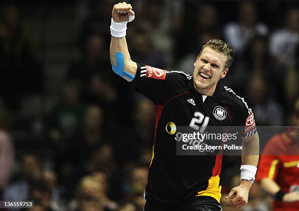 Lars Kaufmann of Germany celebrates during the International handball friendly match between Germany and Hungary at Getec-Arena on January 8, 2012 in...