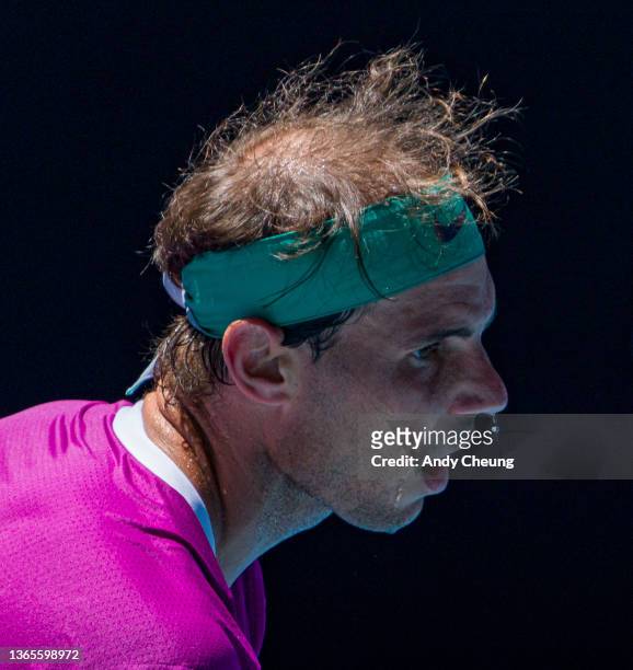Rafael Nadal of Spain serves in his second round singles match against Yannick Hanfmann of Germany during day three of the 2022 Australian Open at...