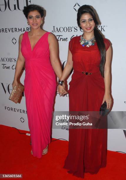 Kajol Devgn and Tanishaa Mukerji attend the Vogue India's 5th anniversary bash on September 22,2012 in Mumbai, India.