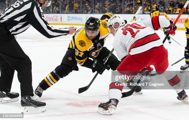 Patrice Bergeron of the Boston Bruins skates during the first period against the Carolina Hurricanes at the TD Garden on January 18, 2022 in Boston,...