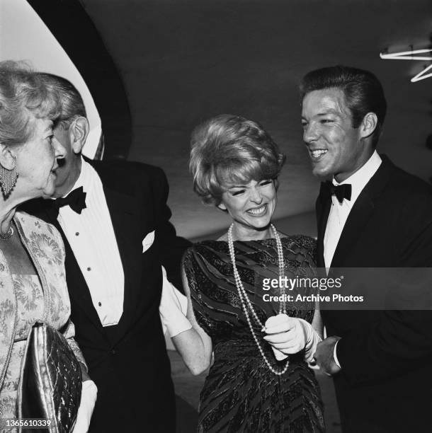 American actors Joan Marshall and Richard Chamberlain at the Primetime Emmy Awards in Los Angeles, USA, 25th May 1964.
