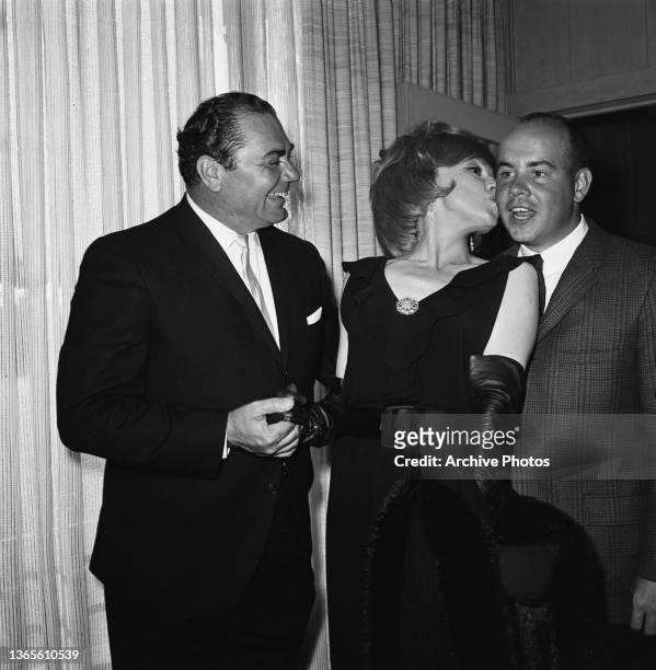 From left to right, American actors Ernest Borgnine , Edie Adams and Tim Conway attend an NBC party for Emmy nominees, USA, 26th May 1963. Borgnine...