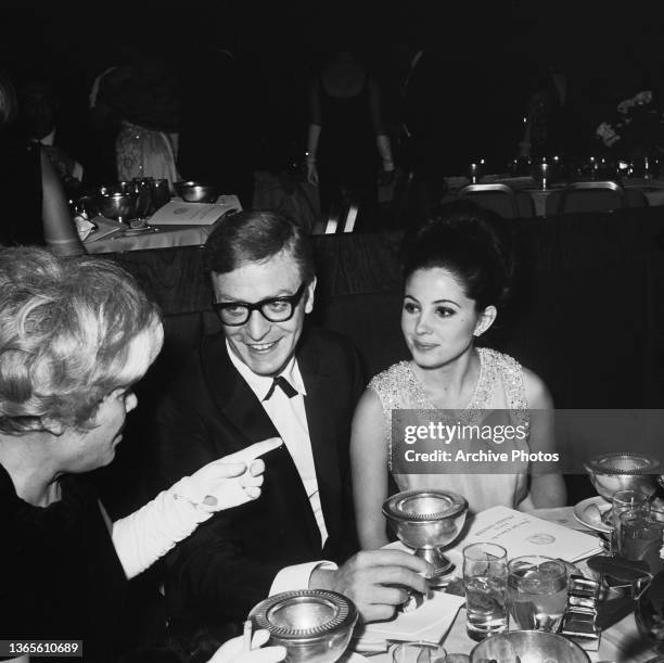 Actors Michael Caine and Barbara Parkins attend the Directors' Guild of America Annual Awards Dinner, USA, 1965.