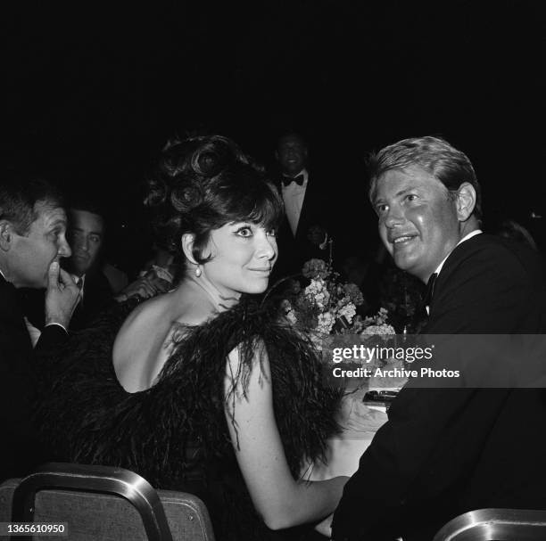 American actor Troy Donahue with his wife, actress Suzanne Pleshette at the Screen Directors Guild of America awards, USA, 1964.