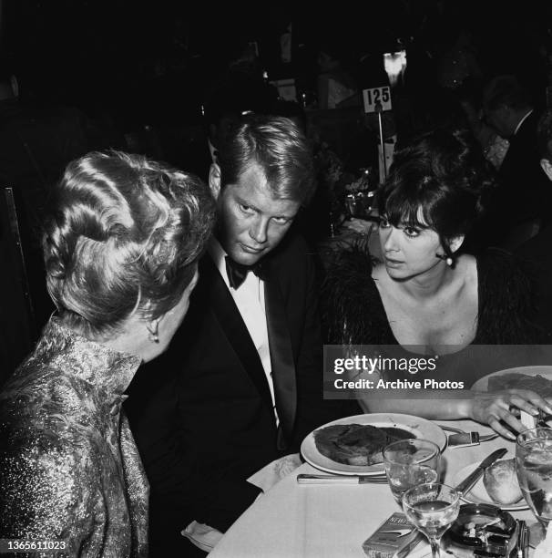 American actor Troy Donahue with his wife, actress Suzanne Pleshette at the Screen Directors Guild of America awards, USA, 1964.